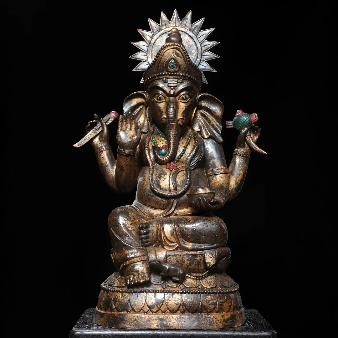 Tibetan brass antique Liu Tuo gold painted face, elephant trunks, Buddha statue of the God of Wealth, a large ornament dedicated