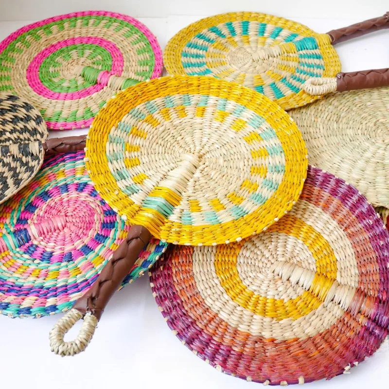 2025 New Hot-selling Seagrass Woven Straw Fan Wall Hanging African Element Wind Wall Decoration Daily Summer Hand Crank Pu
