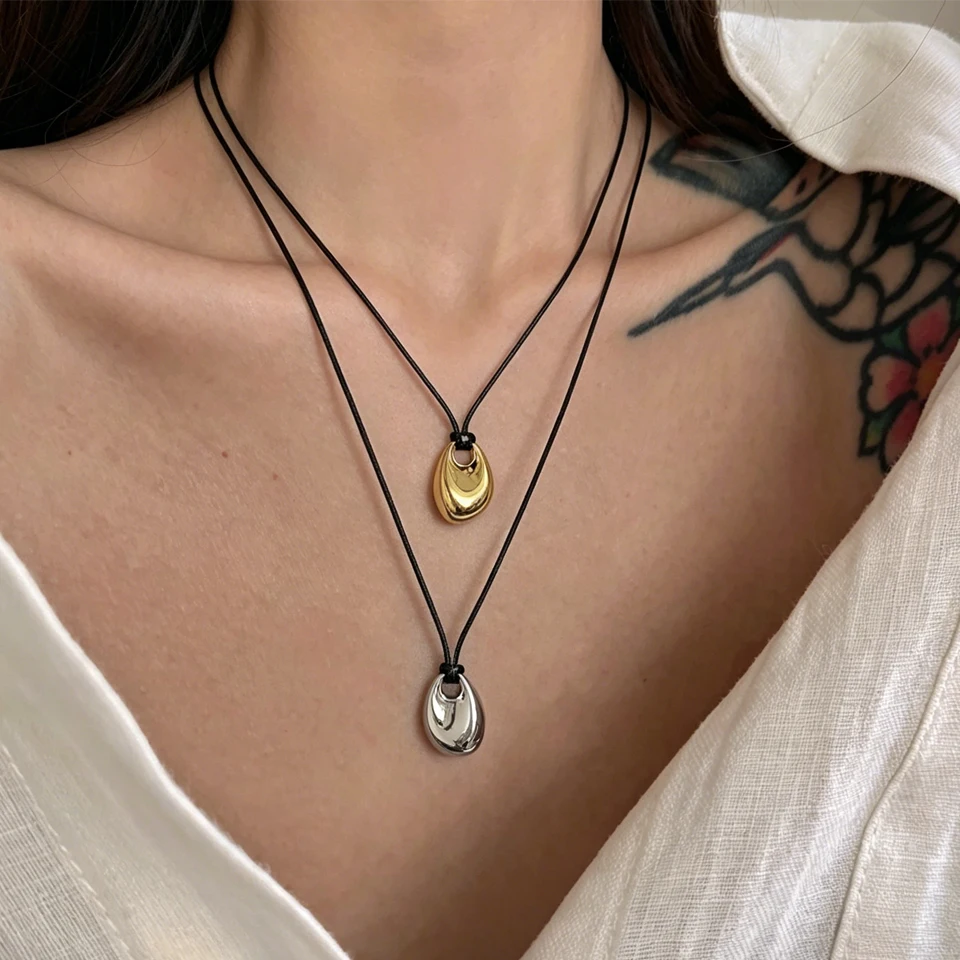 ZAKOL Simple Metal Bean Pendant Necklaces for Women Adjustable Black Pu Leather Clavicle Chain Daily Sweater Jewelry Accessories