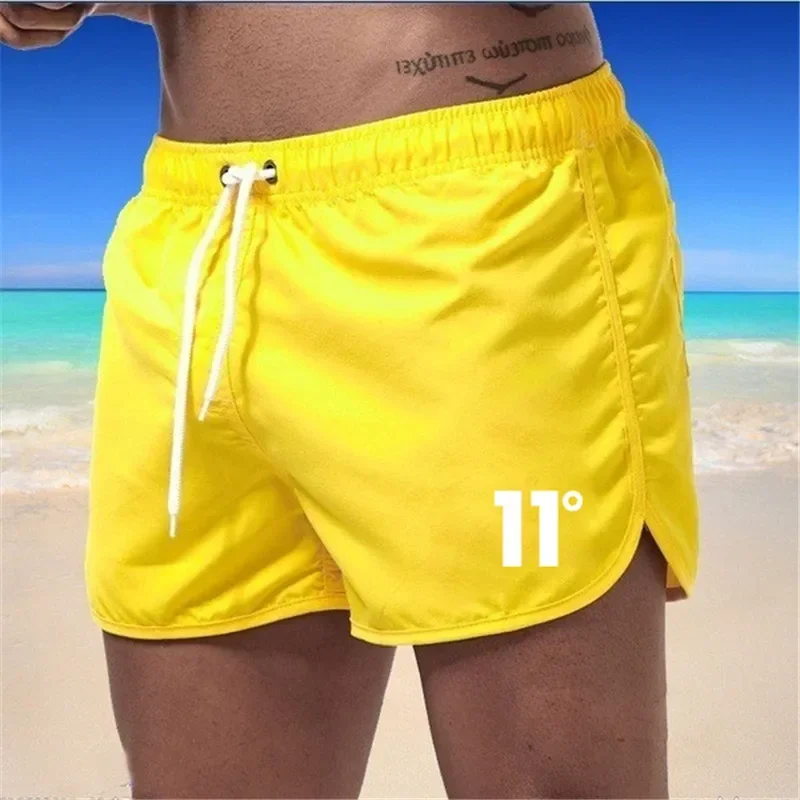 Bañador de secado rápido para hombre, pantalones cortos de playa, Color blanco y negro, talla 11, Color sólido, nueve colores, 2024