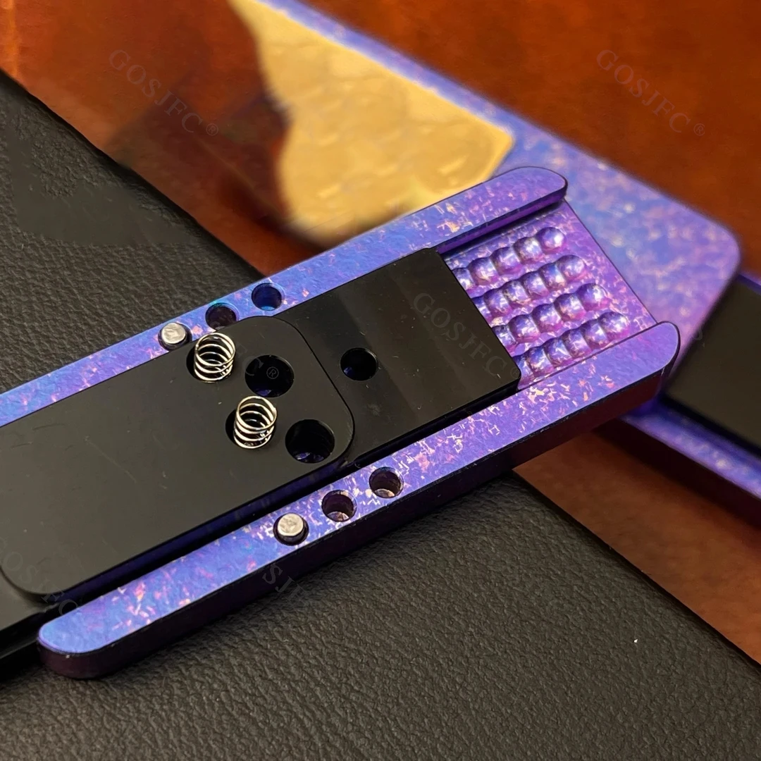 Czterokanałowy mechaniczny gęsty tor ze stopu tytanu Crazy Rabbit z bezpośrednim pchaniem Dingding push card EDC toys