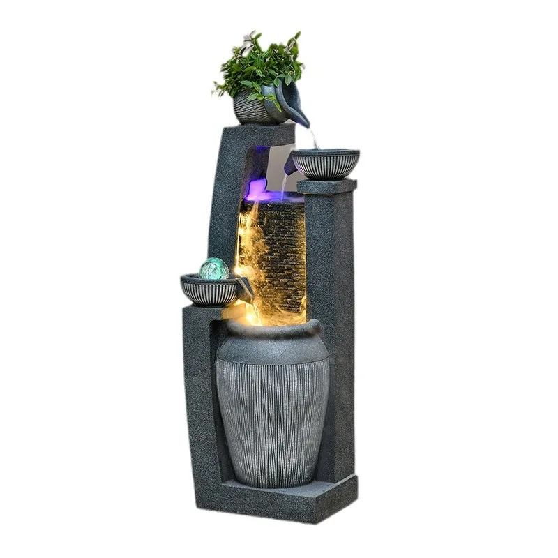 

indoor running water fountain making money, circulating water feature next to sofa