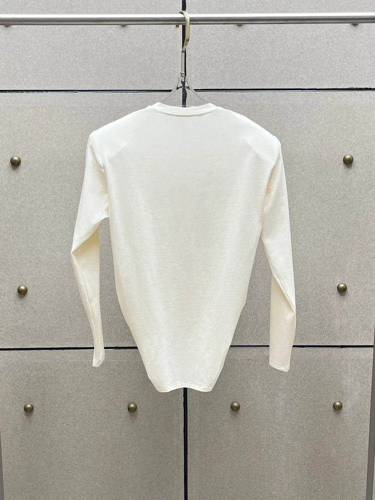 Women's cable-knit top—a stylish, chic long-sleeve Y2K-style tee featuring shoulder pads; a new arrival for Autumn 2026.