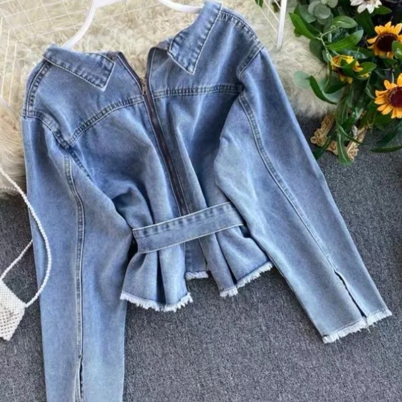 

Изысканный индивидуальный тренд, джинсовая женская куртка, тонкие весенне-осенние модели, тщательные машинные пуговицы, шнурки на талии, короткие топы