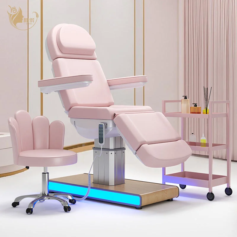 Electric Massage Table With Buff Upholstery And Sturdy Metal Base For Professional Salon Spa Facial And Bodywork Sessions