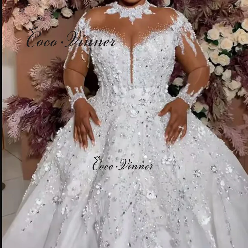 

Customized Luxury Crystal Beading 2025 African Wedding Dress Ball Gown Long Sleeves Illusion Luxury Bridal Dresses W1401