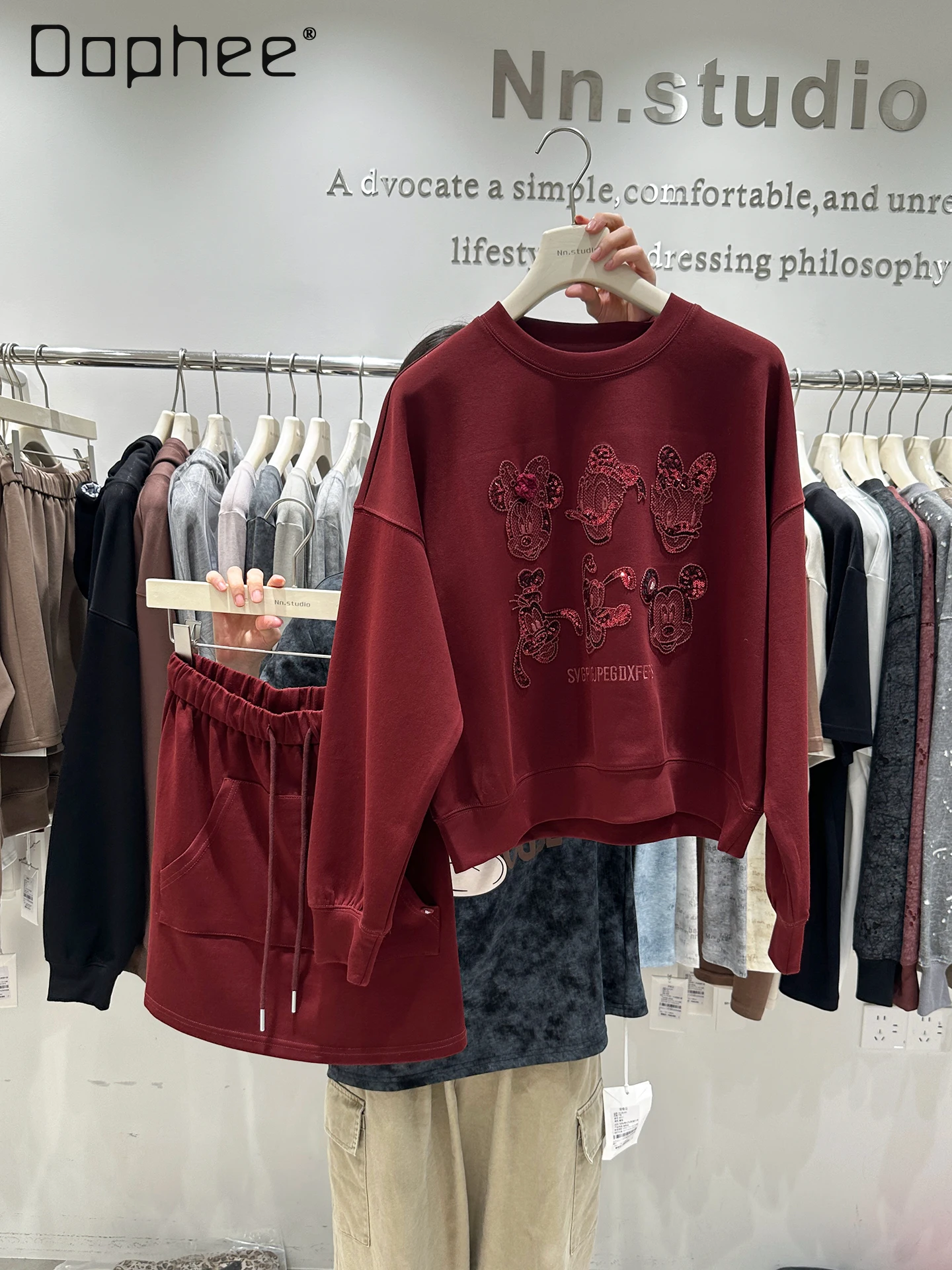 

2025 Autumn New European Heavy Embroidery Cartoon Design Sweatshirt High Waist A-line Skirt Two-piece Sets Women Outfits