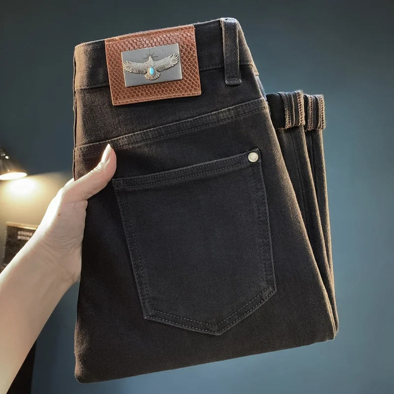 黒の細身ジーンズ メンズ トレンド ライトラグジュアリー 2025年新作 カジュアル ストレッチ 秋冬 厚手パンツ