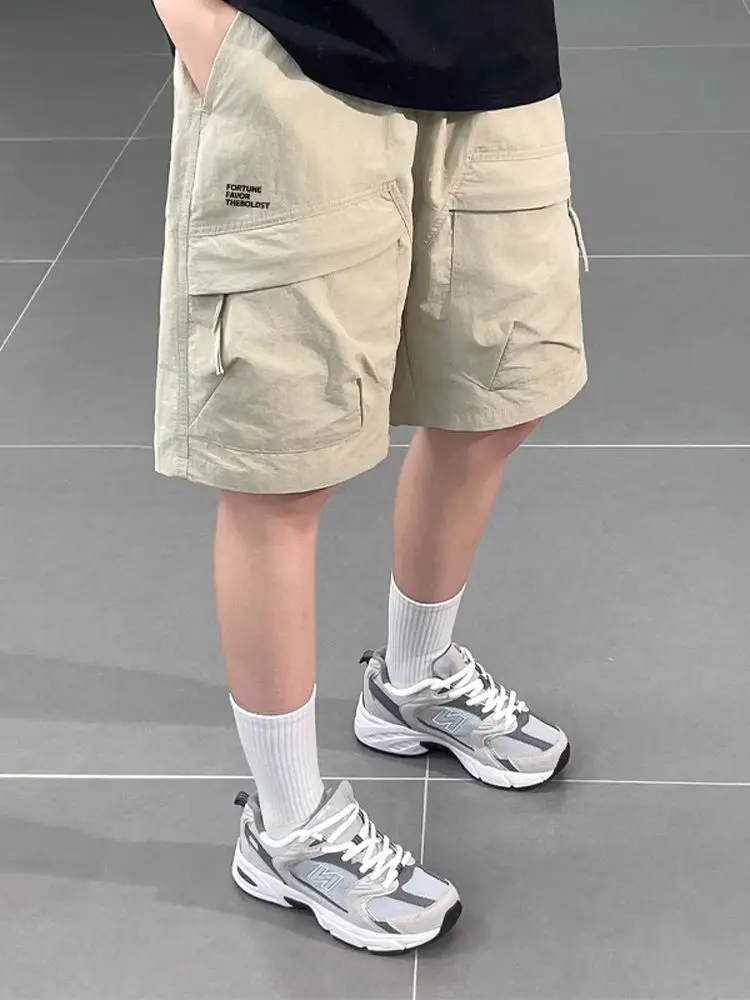 

Свободный крой Ice Silk Спецодежда orts Мужские летние тонкие спортивные брюки средней длины Qui Dry с большими кетами Повседневные прямые брюки...