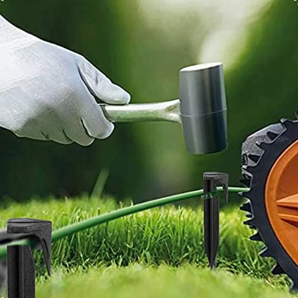 Kołki ograniczające do kosiarki, szpilki do gruntu, kołki mocujące do bezpiecznego kotwienia robotów koszących, kable obwodowe, kotwy do gruntu.