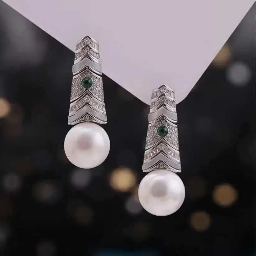 

Великолепные круглые висячие серьги с белым жемчугом Южного моря 10-11 мм 9-10 мм 925s