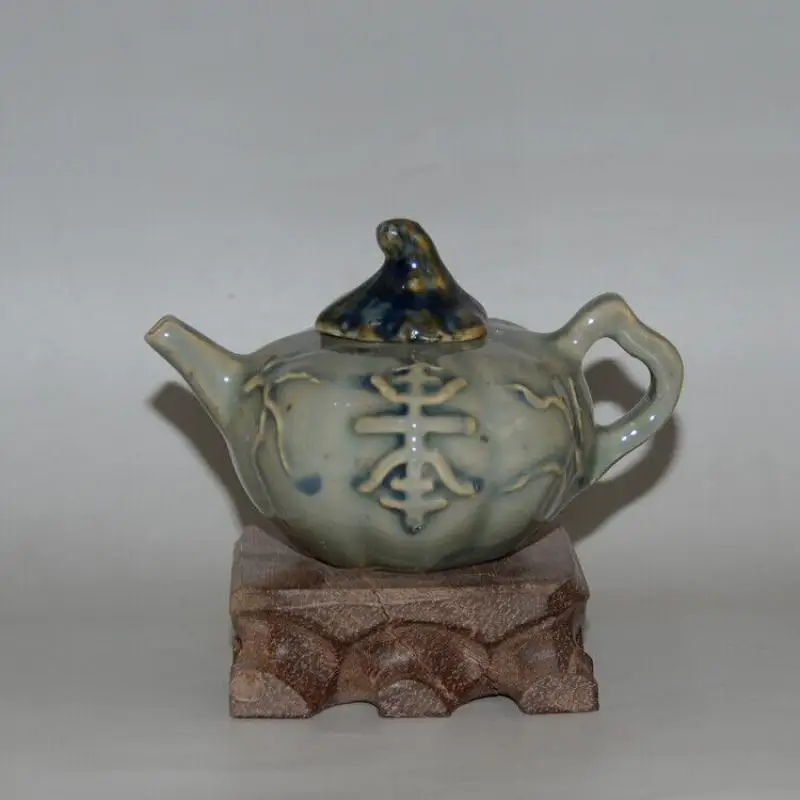 

Collect Ceramic Carving Pumpkin Golden Bell Tea Pot Small Tea Pot Decorations
