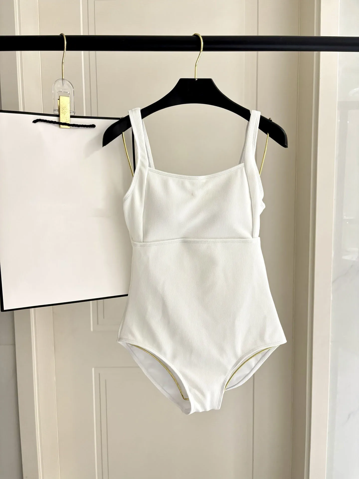 

High-Quality Fashionable White One-Piece Ladies Swimsuit Elegant And Stylish Women's Swimwear