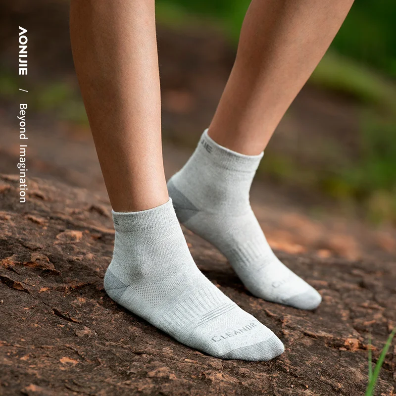 AONIJIE-Calcetines deportivos de tubo medio para hombre y mujer, medias transpirables y desodorantes para correr, Maratón, E4835, 3 pares por paquete