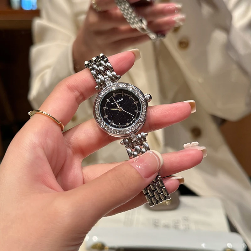 ساعة كوارتز نسائية أنيقة بمينا مرصعة بالنجوم من X-GEAR - ساعة عصرية بسوار من الفولاذ المقاوم للصدأ هدية للمهرجانات