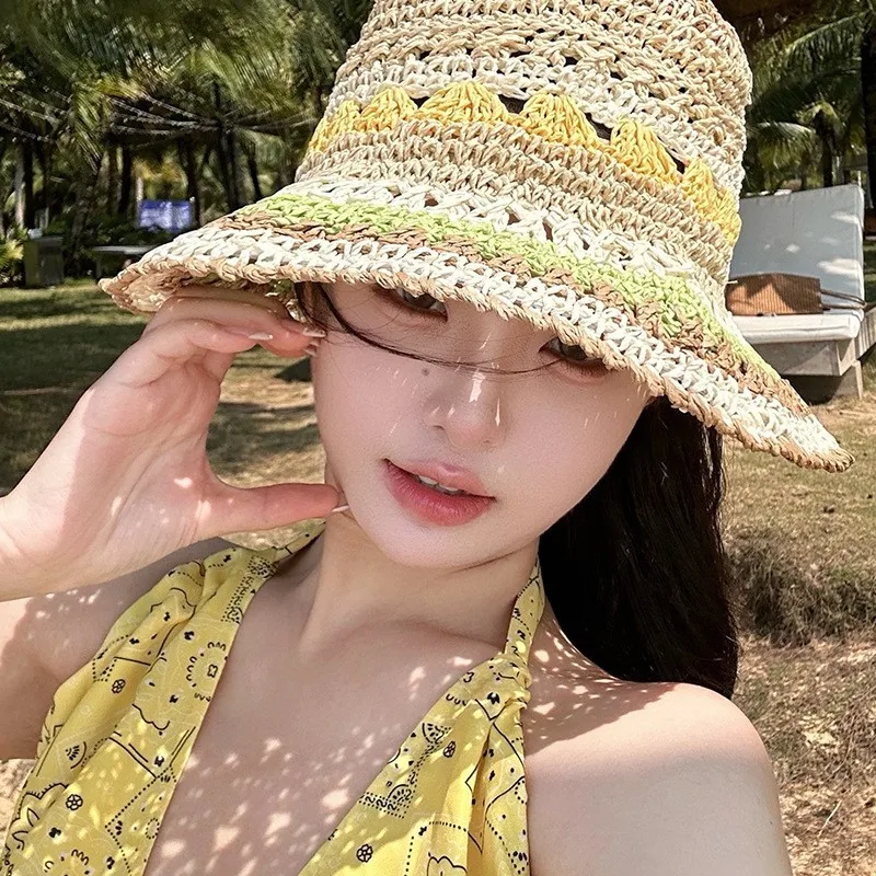 A new style of women's seaside vacation sunshade hat with multiple rainbows and hollowed-out designs fisherman's large brim