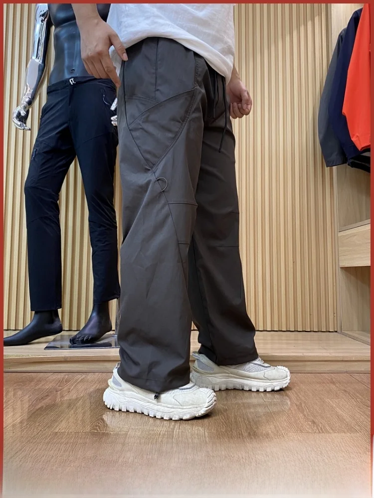 

Функциональные свободные повседневные брюки для улицы с большими клюшками Спецодежда Прямые брюки из полиэфирного волокна Дышащие удобные мужские брюки...
