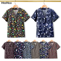 Unisex cuidado de la salud enfermería Scrub estampado patrón Hospital Scrub Tops para mujeres hombres enfermeras moda suave cuello pico camisa de manga corta