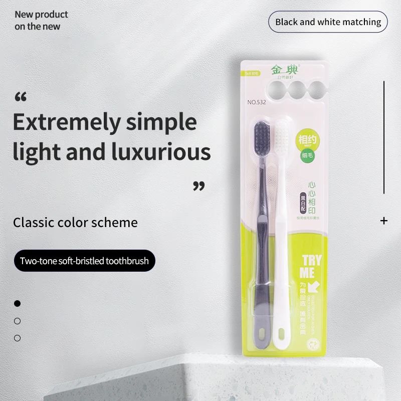 

2 pcs soft bristled toothbrushes, black and white, couple style