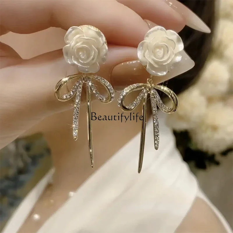 Premium light luxury camellia metal bow earrings French retro long fringed earrings