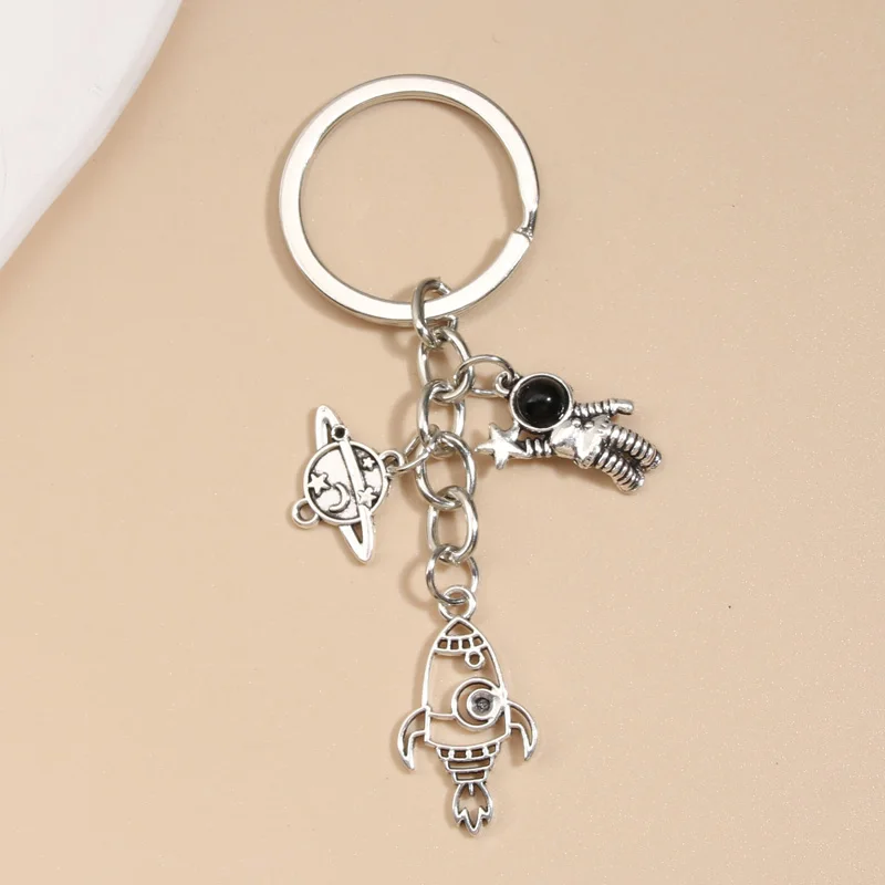 Cute Spaceman Keychain Astronaut Star Planet Rocket Key Ring Dream Key Chains For Women Men Child DIY Handmade Jewelry Gifts