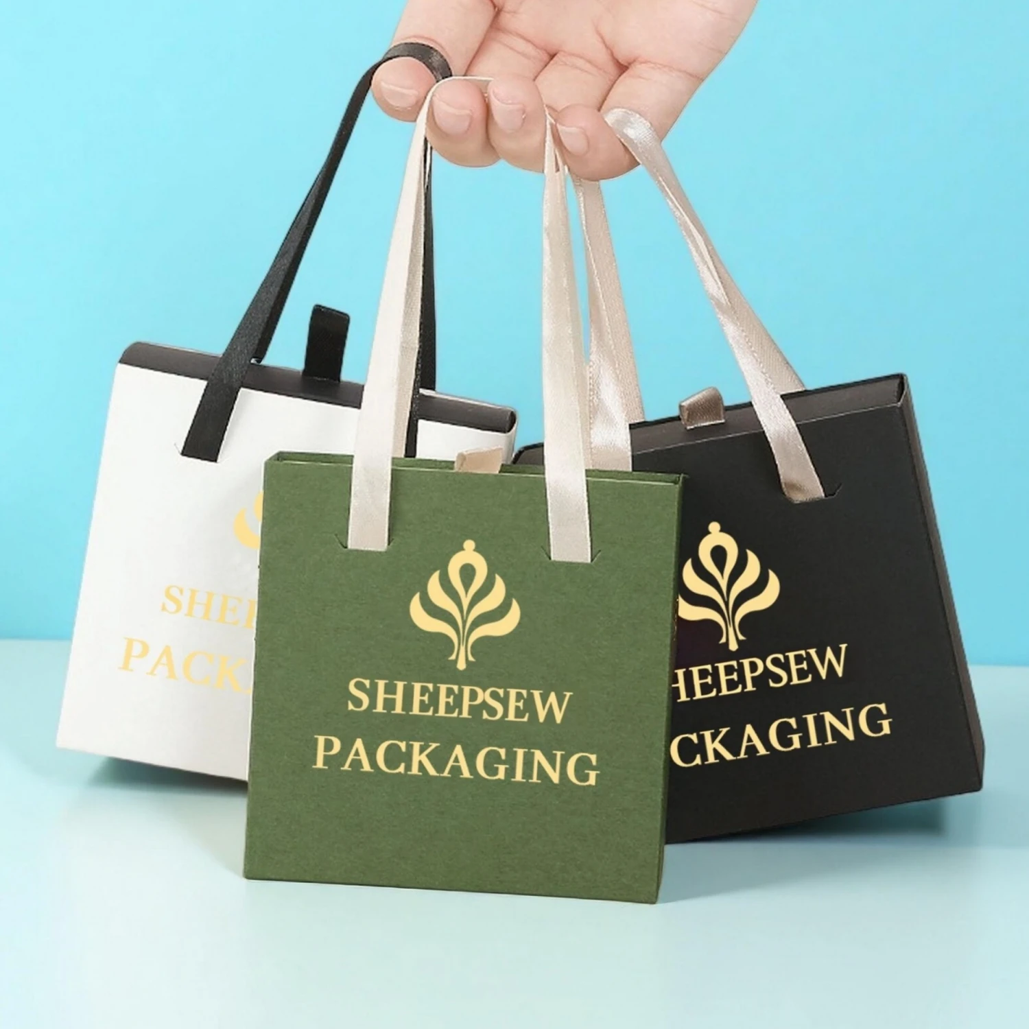 

Персонализированная фиолетовая шкатулка для драгоценностей из 20 шт. с мешочком из микрофибры: набор упаковки с логотипом 10x10x3,5 см