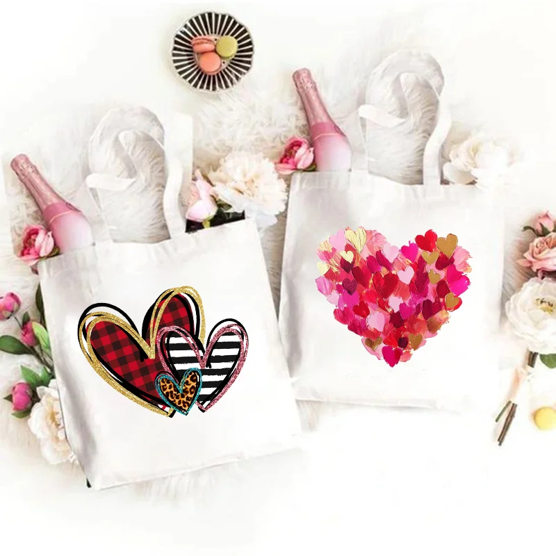 حقيبة يد للنساء موضة عيد الحب ليوبارد الحب القلب الجرافيك قماش حمل حقيبة تسوق سيدة حقيبة كتف حقائب كتب الطالب