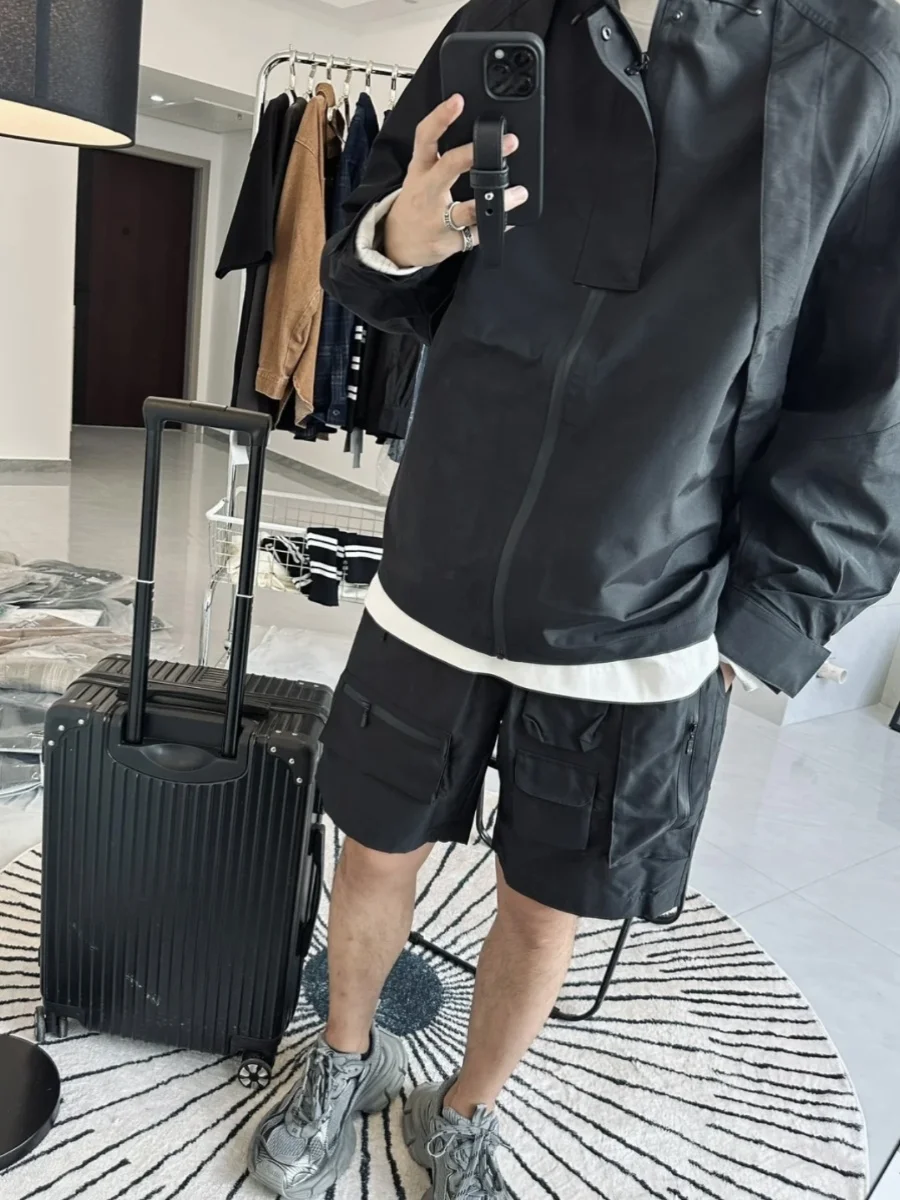 شورتات عمل غير رسمية على الطراز الأمريكي للرجال صيفية فضفاضة بتصميم خارجي شورتات عالية الشارع بخمسة جيوب للشباب نمط نشط