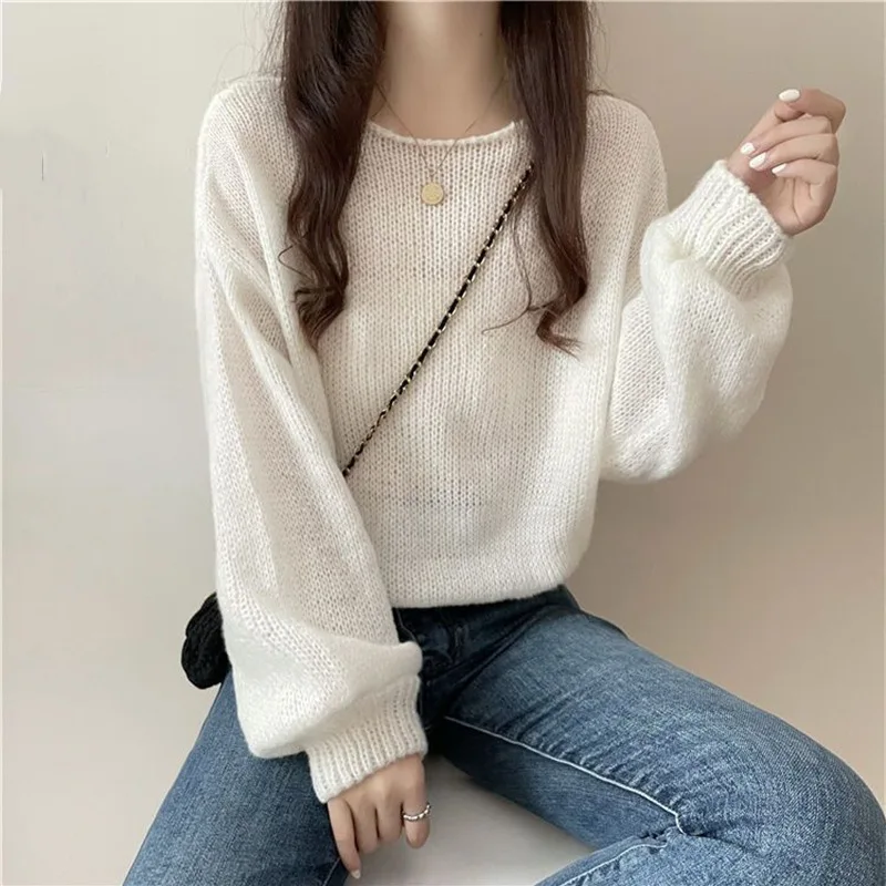 

2023 new Korean version of lantern sleeve sweater knitted smock women spring and summer lazy solid color blouse neckline curling