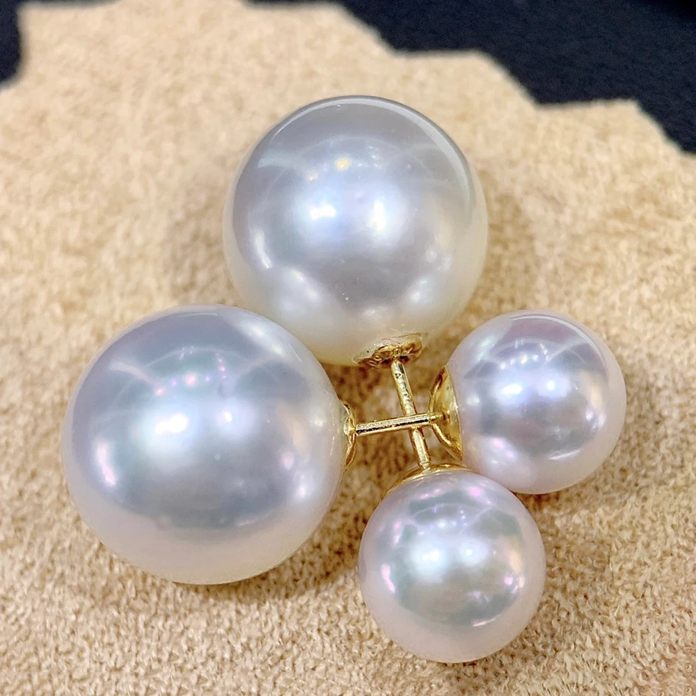 

Классические серьги-гвоздики с двойным жемчугом, двойным дизайном, толстыми штифтами из 18-каратного золота и очень крупными натуральными пресноводными жемчужинами «Аврора» диаметром 13–14 мм