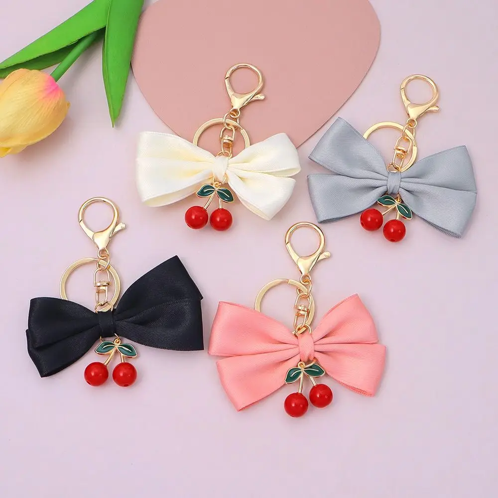 

1Pcs Durable with Cherry Pendant Bowknot Keychain Colorful Fabric Key Holder Handbag Ornaments for Women Friendship Gift