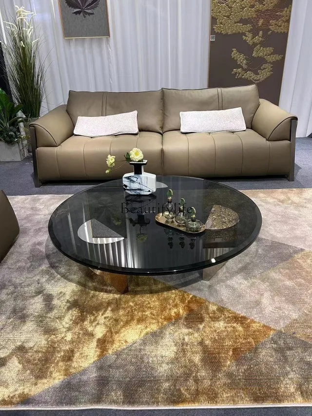

Italian light luxury tempered glass coffee table modern simple small apartment round stainless steel minimalist suspension