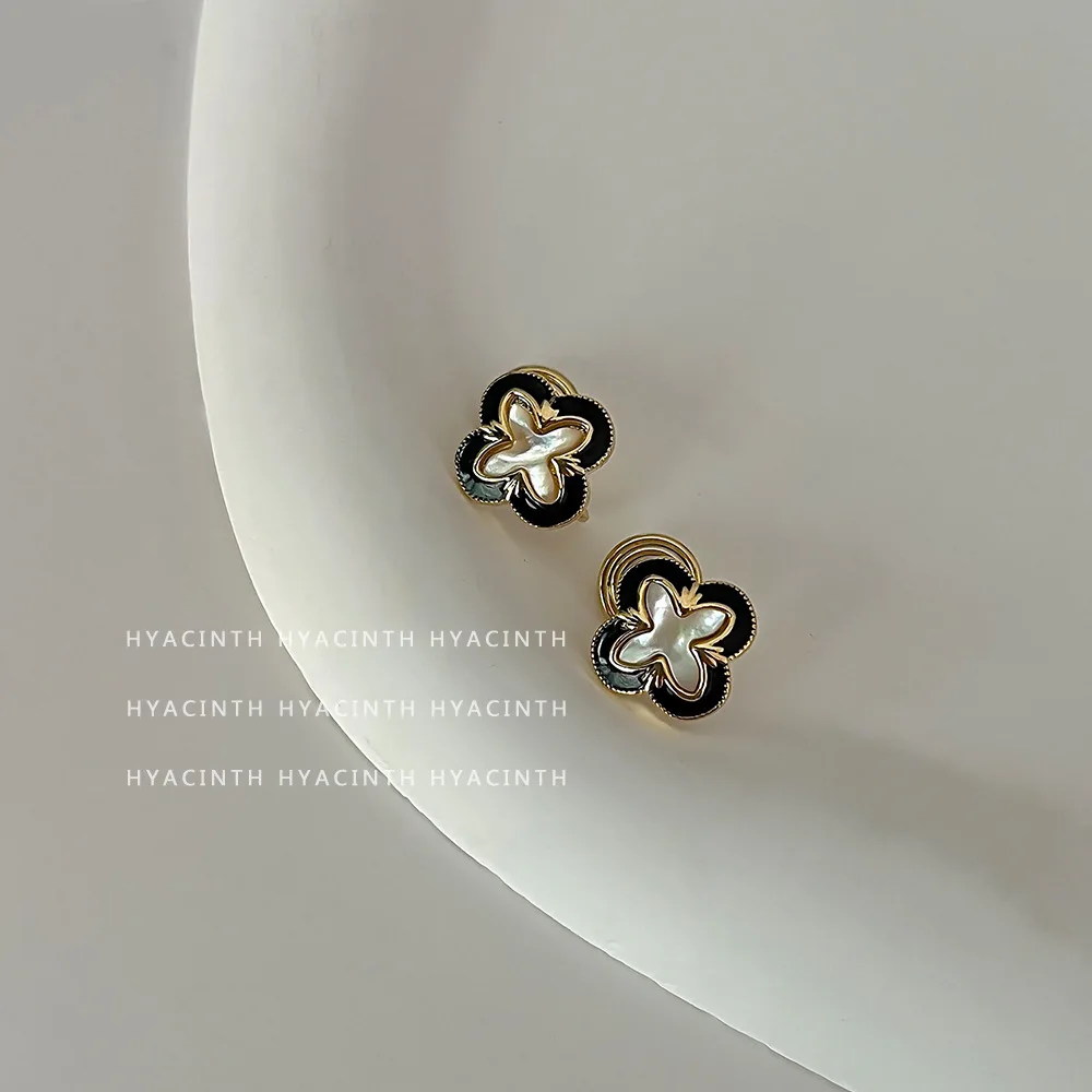 

Vintage French Mosquito Coil Tray Clip-on Earrings with Black Dripping Oil Camellia