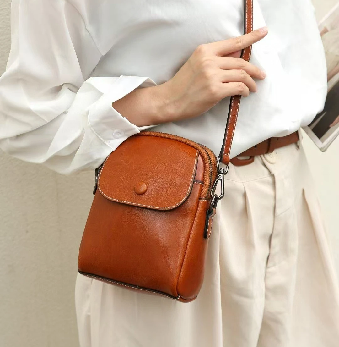 

Ladies real leather high-end shoulder bag retro square flip phone storage diagonal cross commuting small backpack