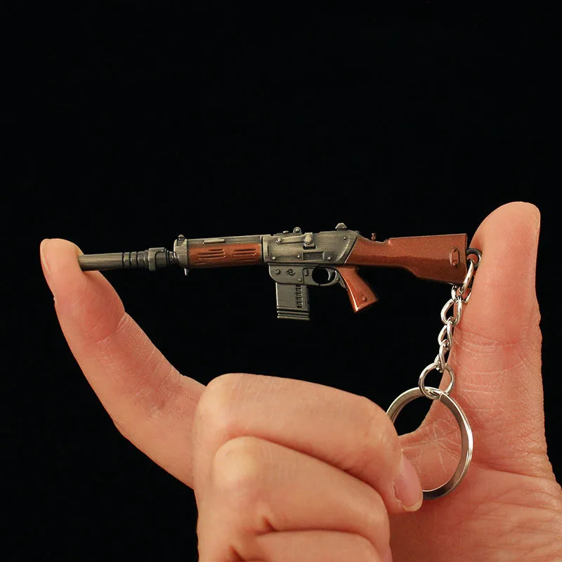 9cm Mini Gun Model Keychain Model Jewelry Weapon Metal Pendant Key Chain Chaveiro Bag Car Key Holders Gift For Kids Men