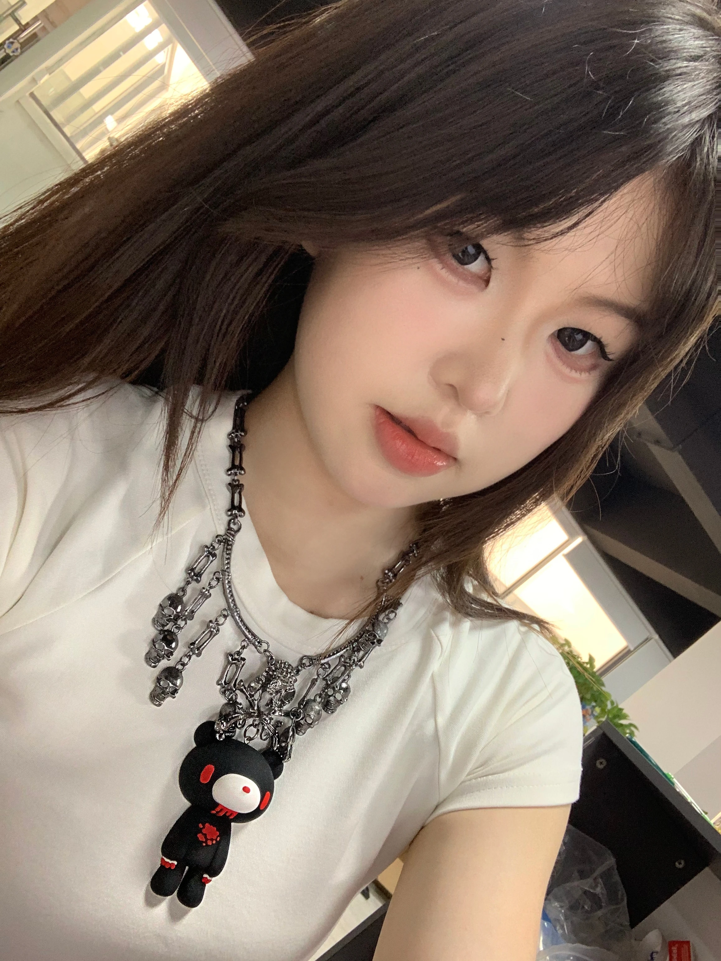 Edgy necklace with skull - adorned chain & a central Gloomy Bear charm. Bold, gothic - cute style.