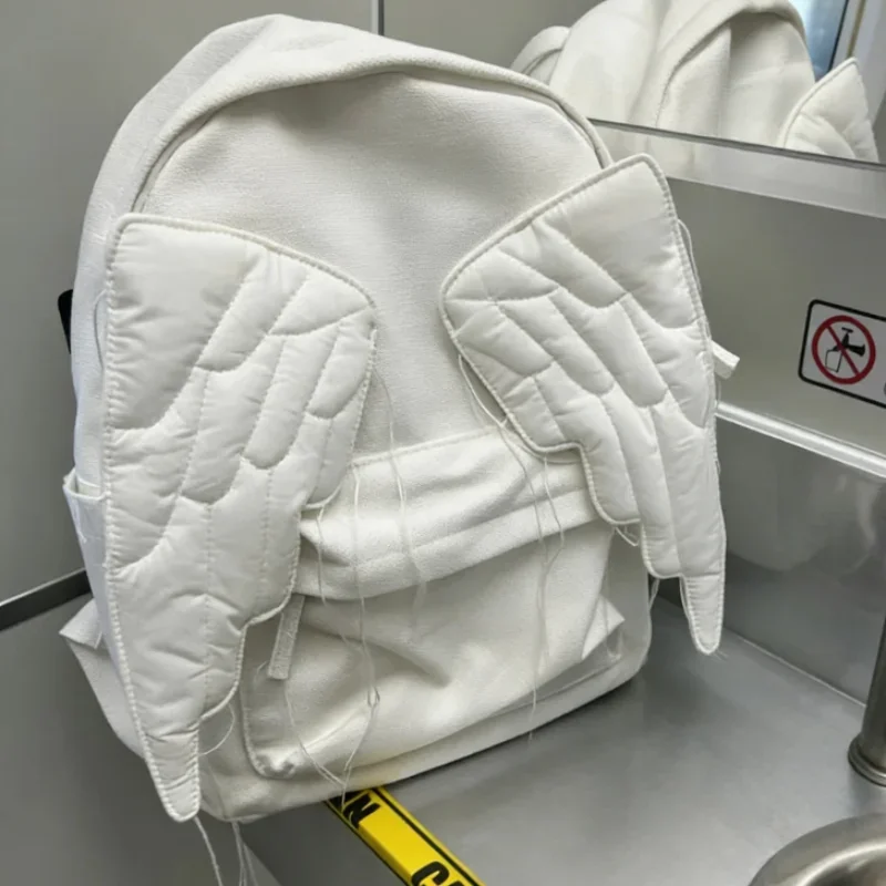 Style Wing Backpack For Women Japanese Cute Angel Canvas Bag Creative Tassel Solid Color Student Large Capacity Shoulder Bag
