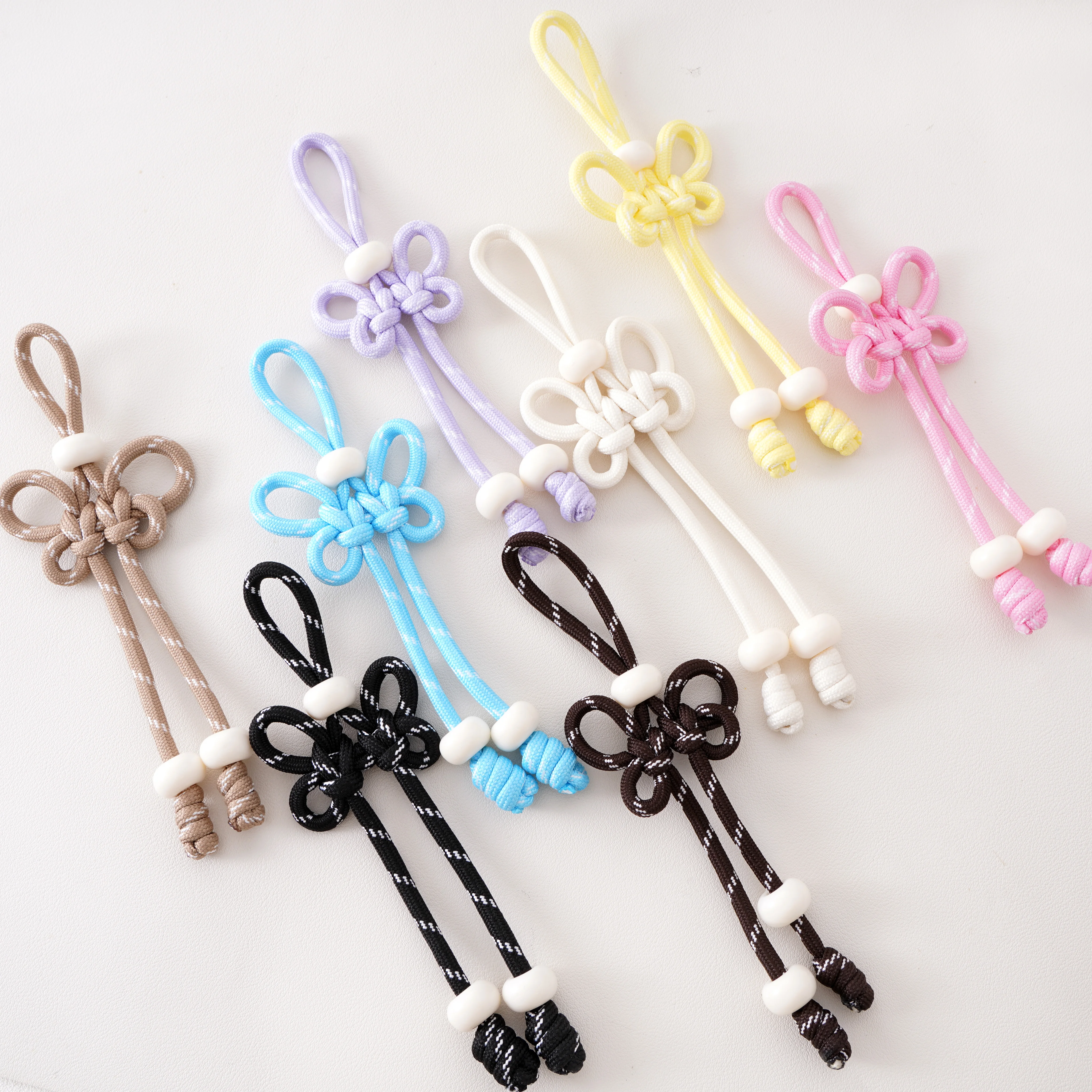 

1Pcs Handwoven Nylon Rope Keychain with Colorful Paracord,Bead Bag Charm Carabiner Knot Lanyard Keyring for Friendship Gifts