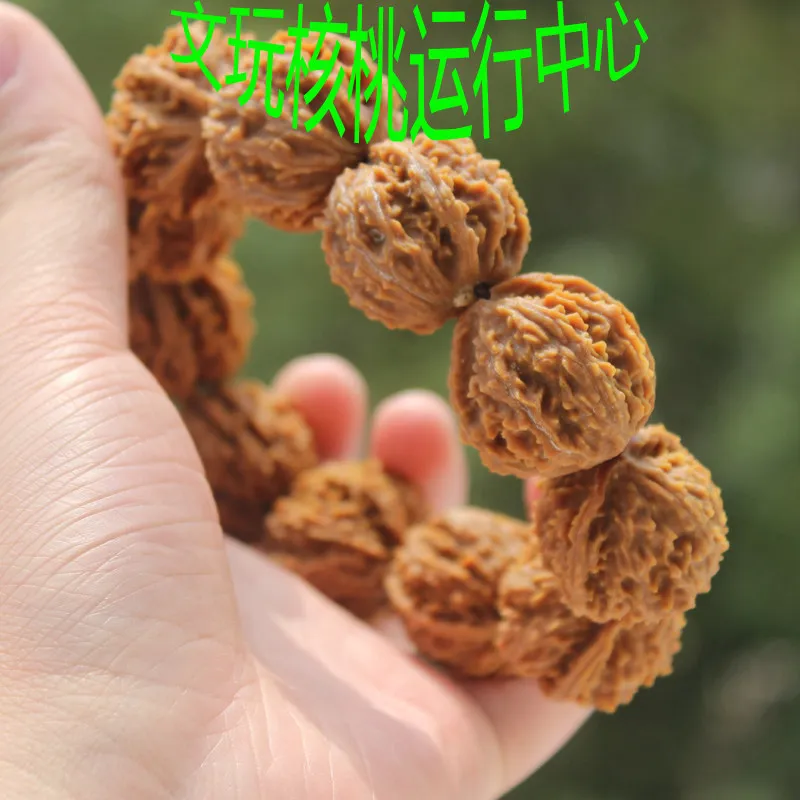 Wild-grown Beijing eight-sided walnuts with deep grooves thick veins and many thorns making them rough to the touch.11 bead