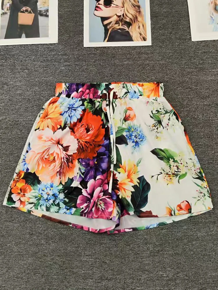 Primavera/Verano 2025 nuevos pantalones de mujer con estampado de flores camisa de cintura abierta Top cintura elástica pantalones cortos de pierna ancha temperamento de dos piezas sui