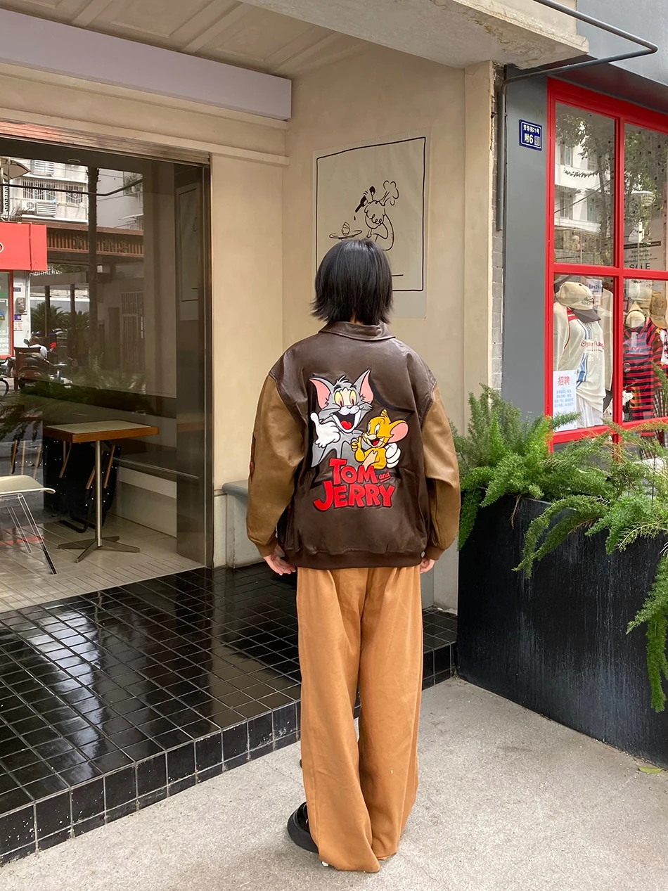 เสื้อแจ็คเก็ตหนัง PU สไตล์เรโทรอเมริกันลายการ์ตูนปัก แบรนด์ BIBULU ทรงหลวม สไตล์ลำลอง สำหรับผู้หญิง