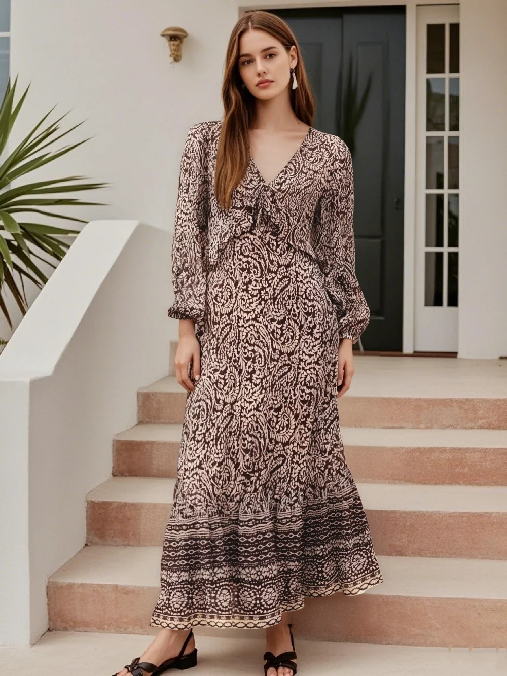 PB&ZA's new women's dress features a V-neck, long puff sleeves, knot details and paisley pattern for a vintage look