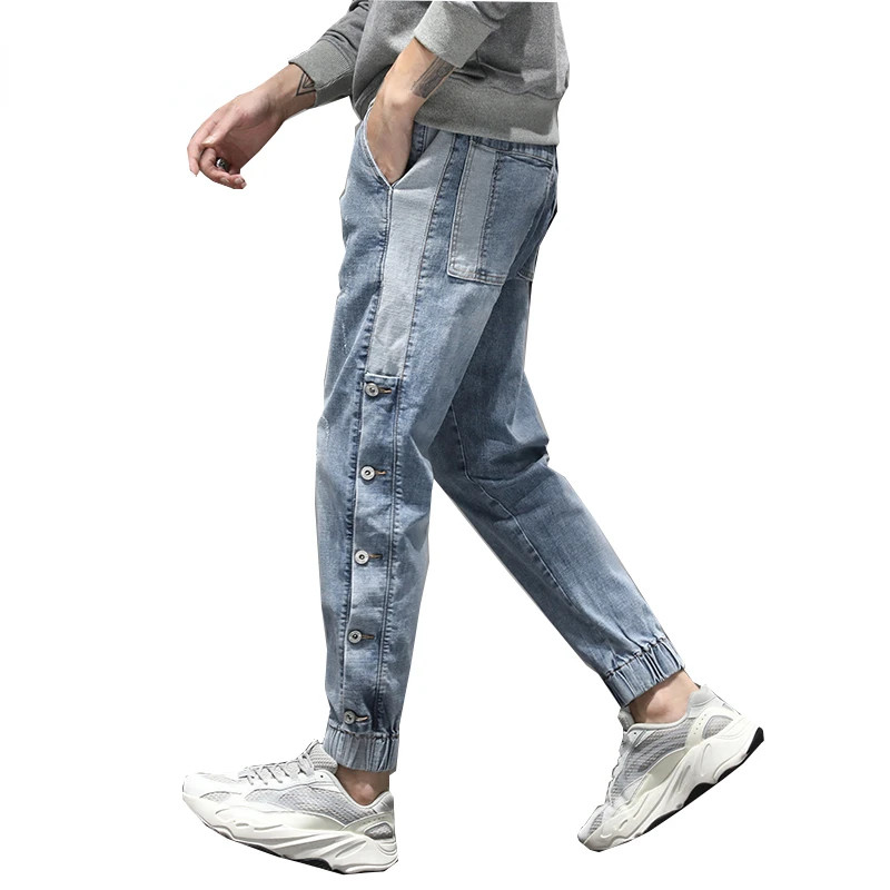 Jeans uomo azzurro elastico in vita bottoni laterali alla moda Streetwear coulisse Jeans di marca di alta qualità pantaloni da jogging maschili