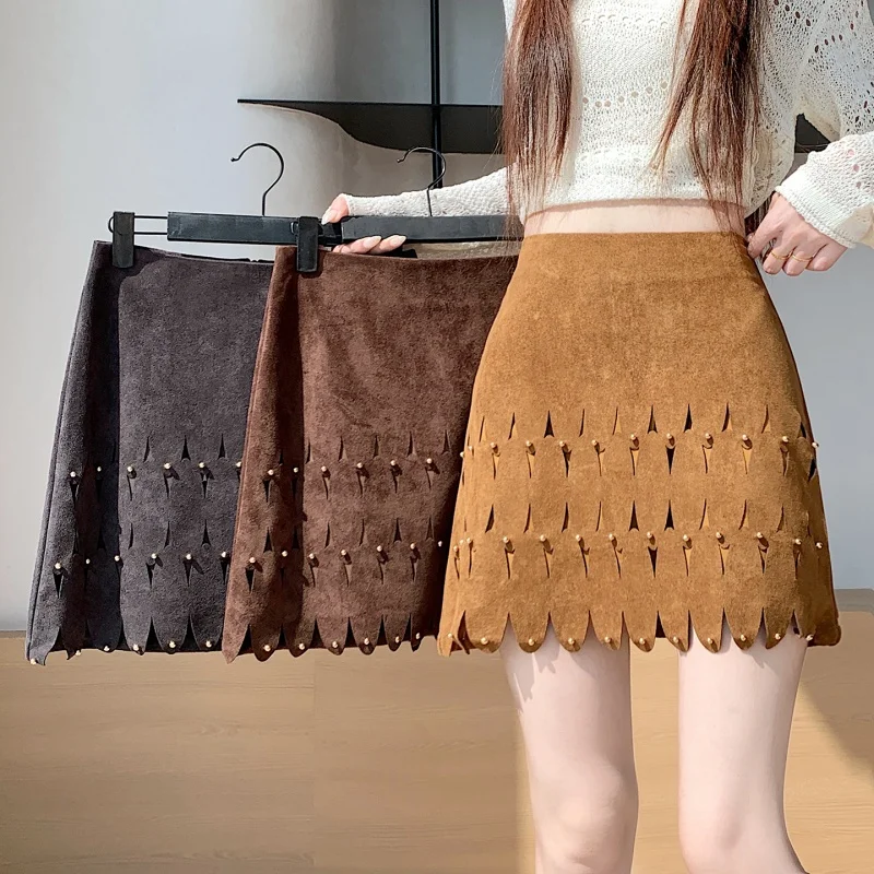 Autumn Winter Design Hollow Out Petal Rivet Suede A-line Mini Skirt For Women Fashion Bag Hip Sexy Ladies Short Skirt