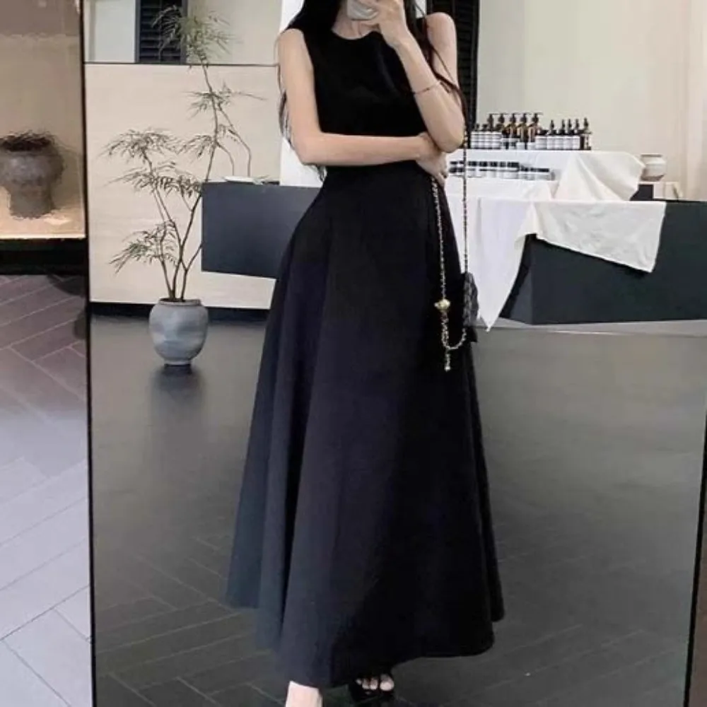 Ins Fashion U الرقبة بلا أكمام فستان طويل مزاجه سترة دون أكمام بلون تنورة طويلة ألف خط طويل المرأة فستان كوري الطرف
