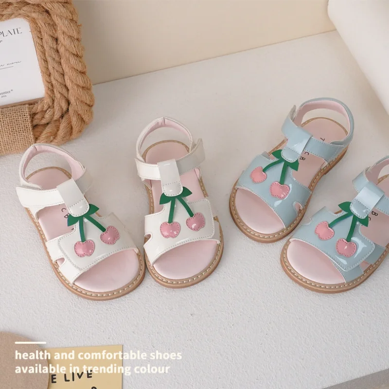 Unishuni-Sandalias de charol para niñas, zapatos de verano con punta abierta y Correa en T, zapatos planos informales de princesa y cereza