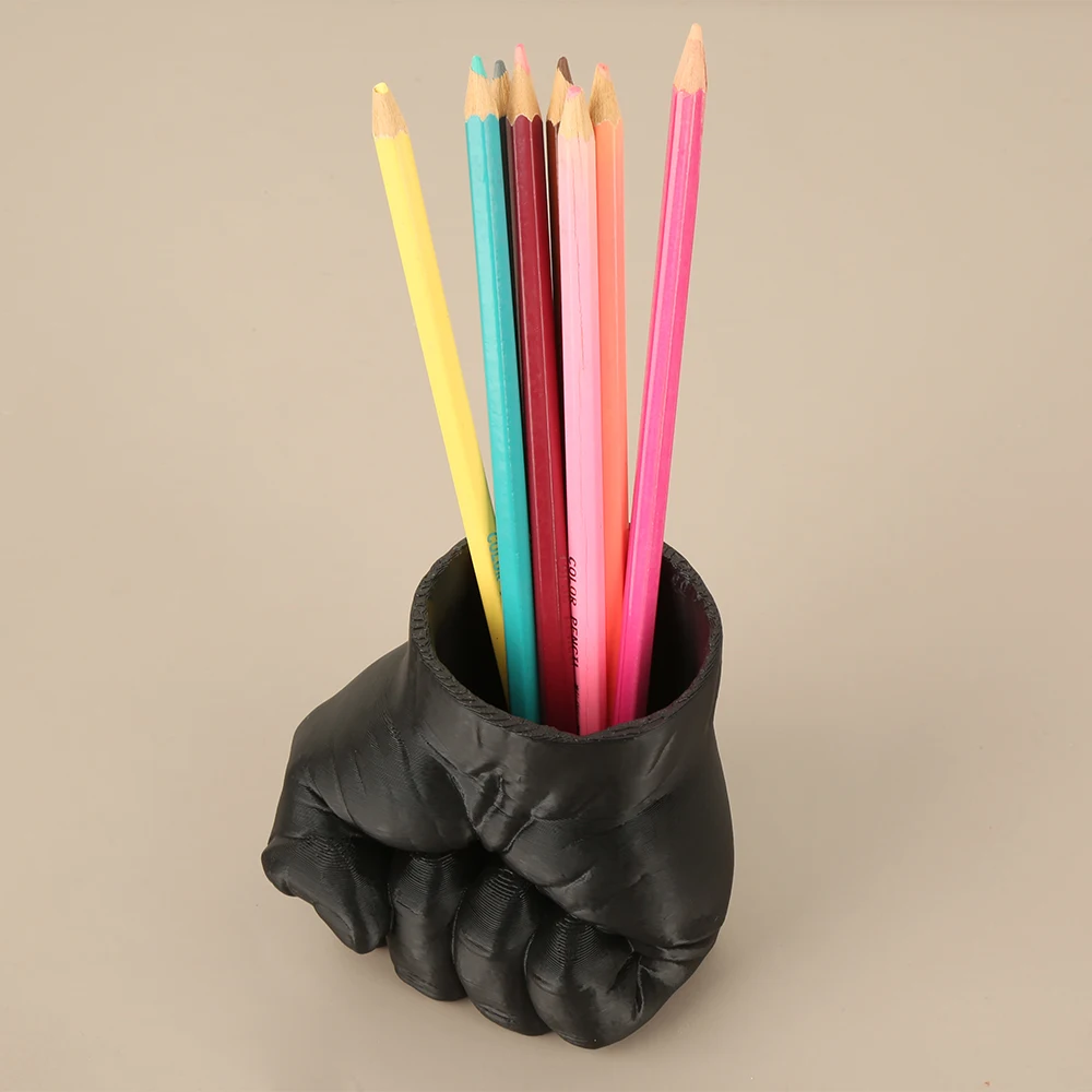 suporte-criativo-para-canetas-em-formato-de-punho-para-armazenamento-e-decoracao-de-material-de-escritorio-em-mesa