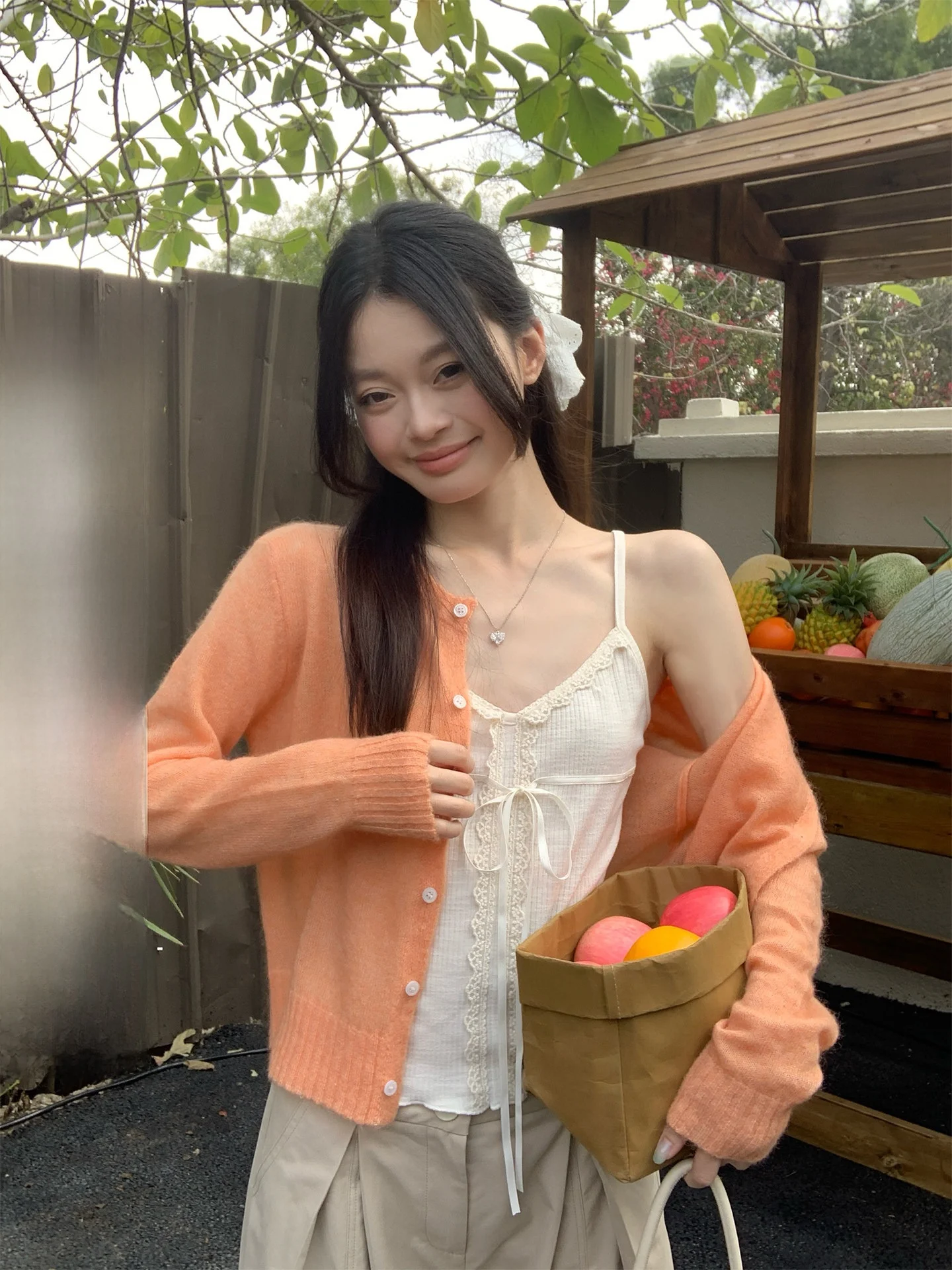 

Song Zhengen Light Orange Thin round Neck Knitted Open Cardigan Women's Loose Korean Style High-End Unique Beautiful Top