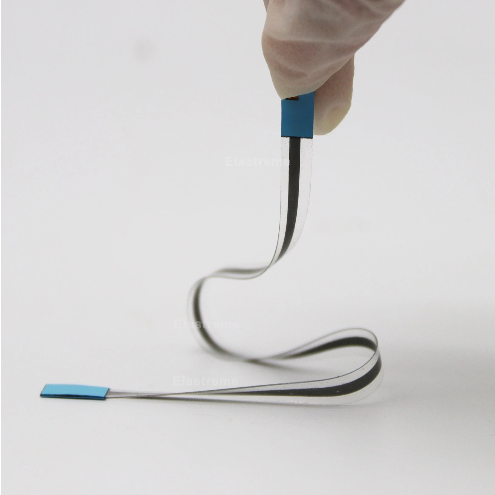 Stretchable liquid metal wire/elastic conductor