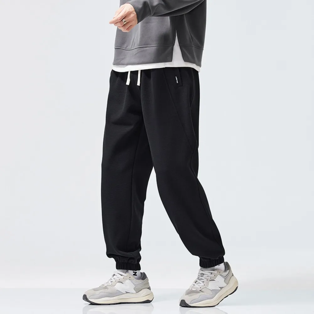 

Весенне-осенние новые стильные повседневные спортивные штаны в вафельную клетку, мужские спортивные универсальные длинные брюки на шнурке